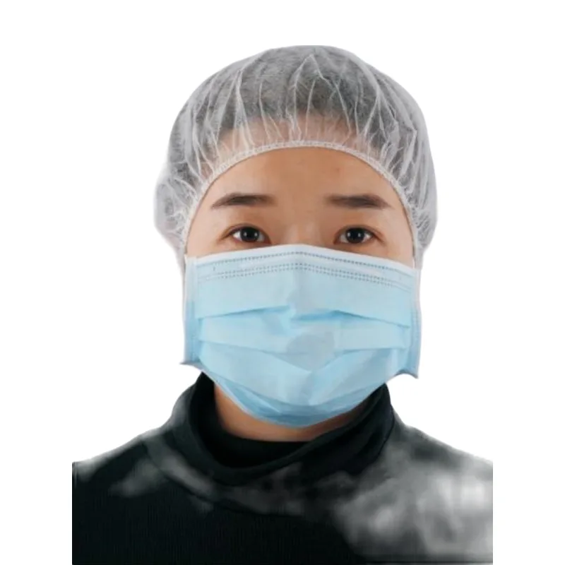White pleated bouffant cap worn with a blue face mask