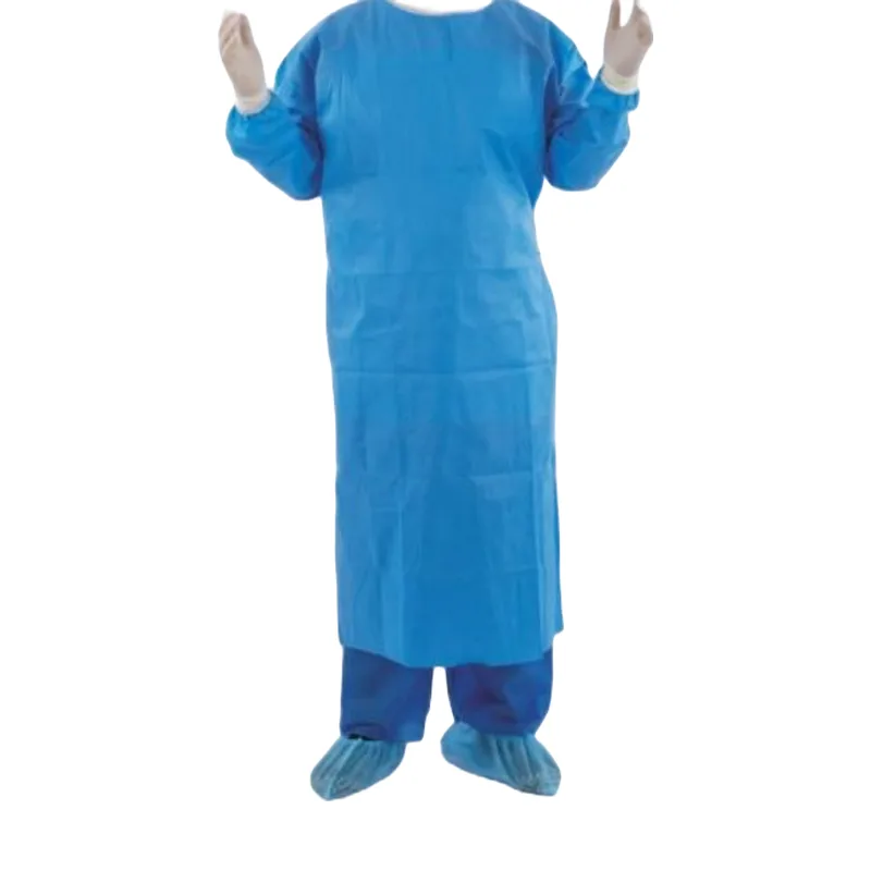 Blue SMS surgical gown with knitted cuffs, worn with shoe covers